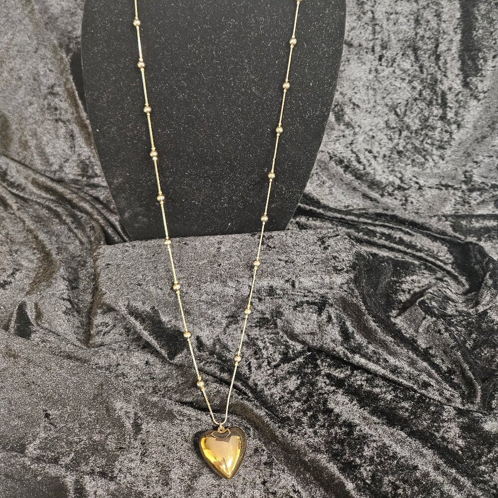 Anne Klein signed gold toned necklace with large heart pendant - 18" chain